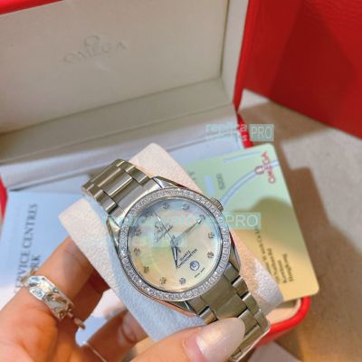 Omega Replica Ladies Watch White MOP Dial Diamonds Bezel Stainless Steel Strap 33mm